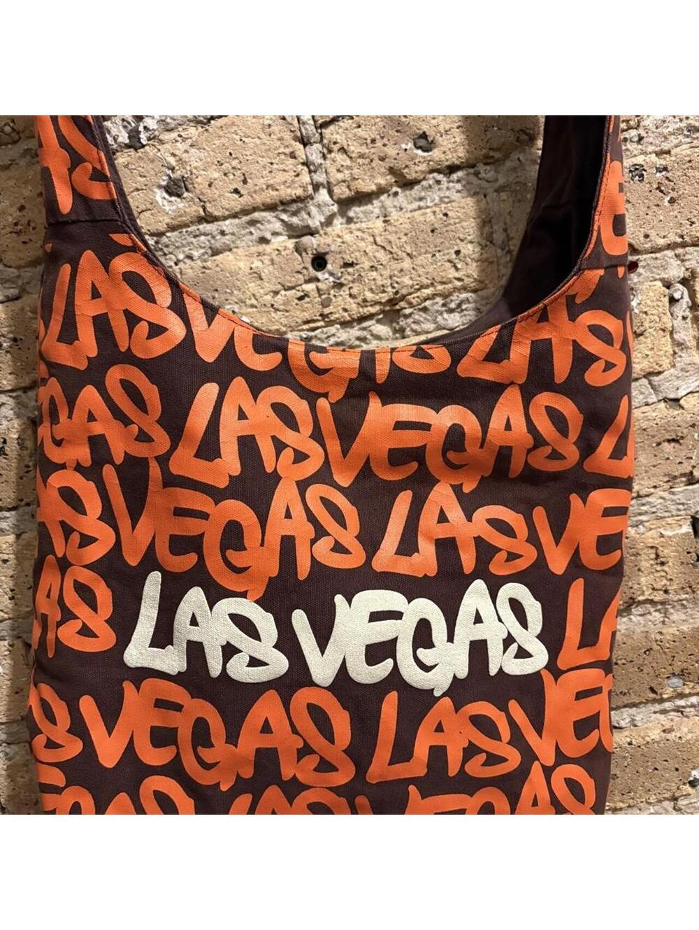 robin ruth graffiti style orange brown crossbody las vegas bag